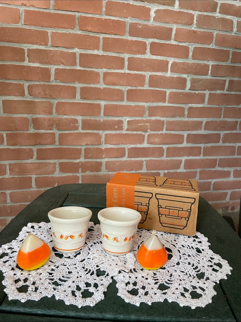 SET OF 2 LONGABERGER CANDY CORN VOTIVES WITH CANDY CORN CANDLES.